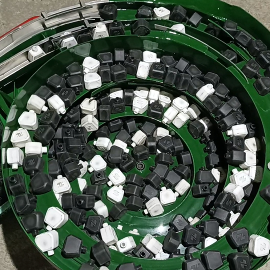 Phễu rung cấp hộp mực